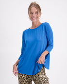 3/4 Sleeve Leaf Back T-Shirt in vibrant royal blue with round neckline and relaxed fit, shown on light background. Stretchy adaptive design featuring unique leaf-style back opening for easy wear, perfect for casual and dressy occasions.