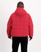 Elly Universal Puffer Jacket shown from back view in vibrant red, featuring quilted design, hooded neckline, and adaptive fit. Comfortable, lightweight puffer with spacious cut, ideal for wheelchair users, photographed against white background.