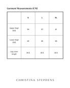 Catheter Bag Leg Cover size chart showing measurements in centimeters for three sizes: S, L, and XL. Includes upper thigh, lower thigh, and leg cover length measurements in a clean, organized table format.