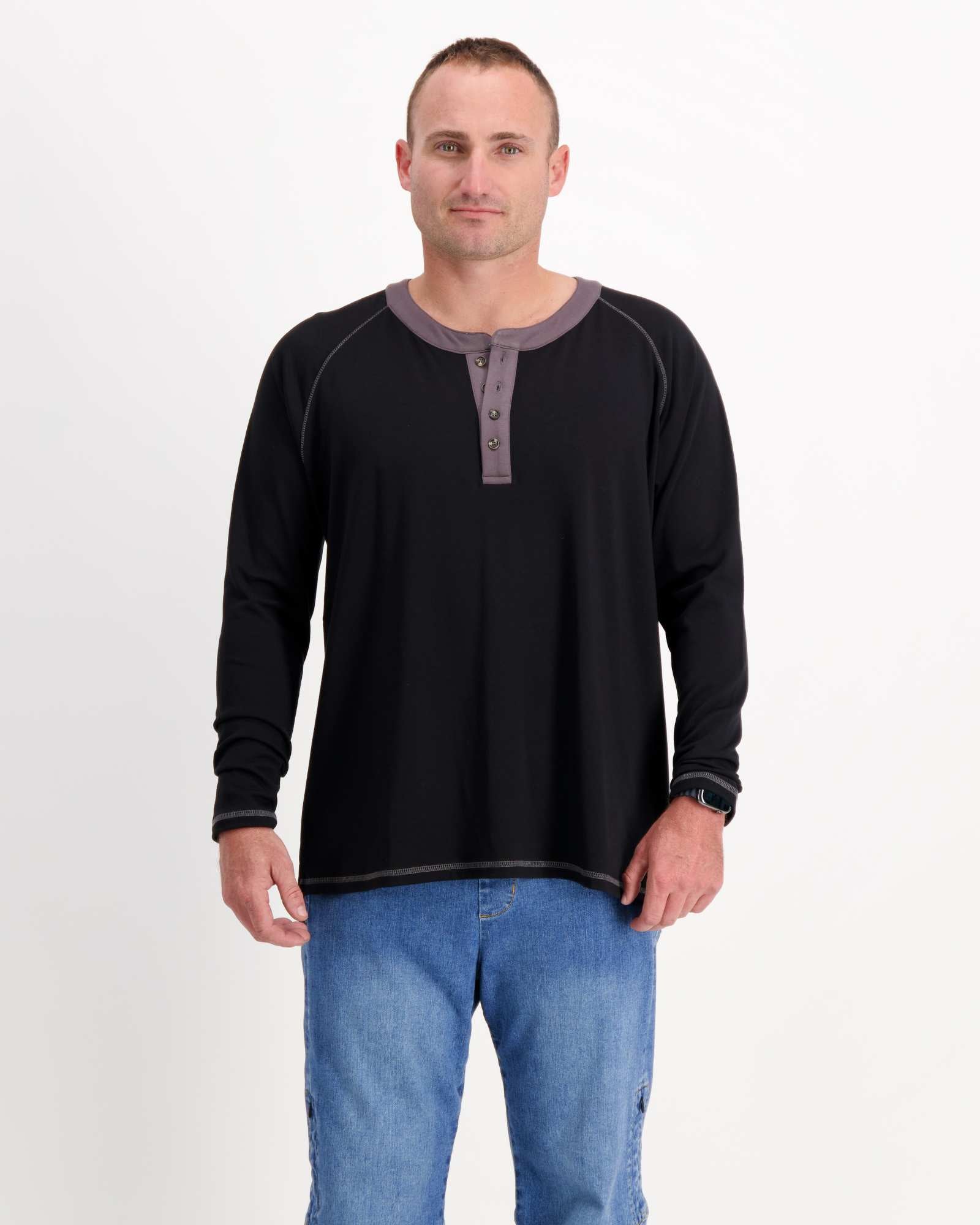 Sir Lord Raglan T-Shirt in classic black with gray contrast henley collar and long sleeves, worn with blue jeans against white background, showcasing comfortable A-line fit and casual yet refined styling.