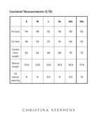 Size chart for Maggie Thermal Top displaying measurements in centimeters across S to 3XL sizes, including bust, hem, center front length, sleeve length, and sleeve opening dimensions in a clear tabular format