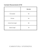 Size chart for Oceania Kaftan displaying measurements in centimeters including shoulder width (50cm), bust (52cm), front length (64cm), and sleeve length (74cm), with one-size design specification