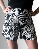 Shelley Adaptive High-Rise Shorts featuring a bold black and white abstract floral print with wide pull tabs and extra-wide waistband. The shorts showcase a modern silhouette with a comfortable high-rise fit against a light studio background.